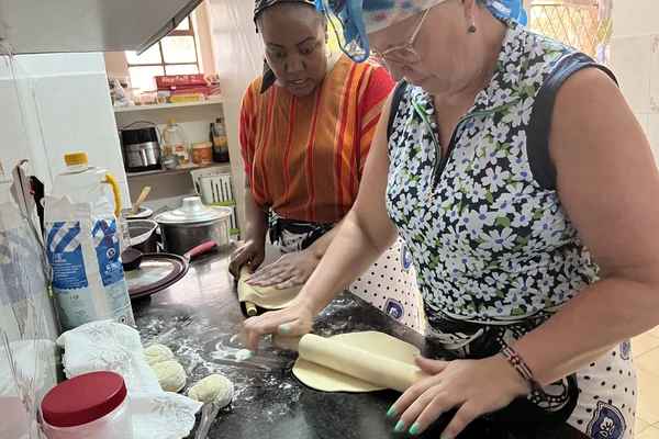 Preparing a traditional Kenyan meal during a cooking class